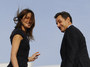 Dobe se fotografuje francouzsk prezident Sarkozy. Je toti asto doprovzen svoj enou, bvalou modelkou.